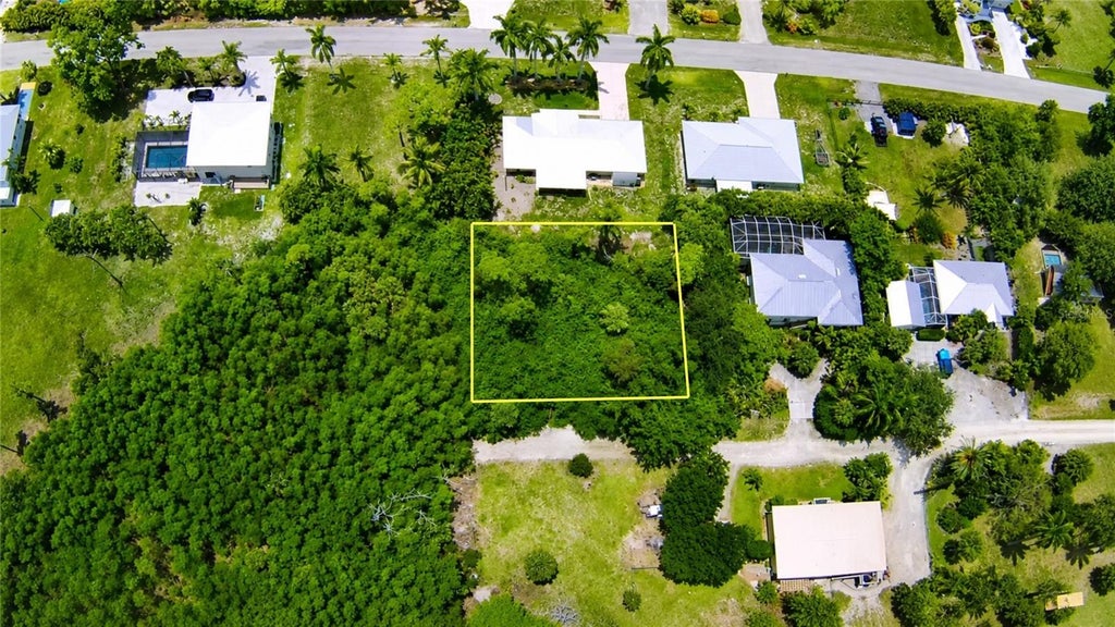 Photo of 7455 Georgiana Drive, Bokeelia, FL 33922 (MLS # N6144619)