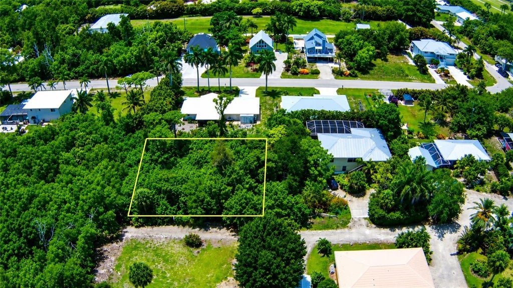 Photo of 7455 Georgiana Drive, Bokeelia, FL 33922 (MLS # N6144619)
