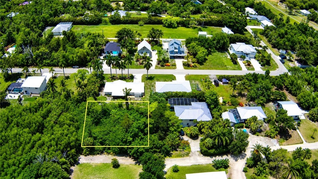 Photo of 7455 Georgiana Drive, Bokeelia, FL 33922 (MLS # N6144619)