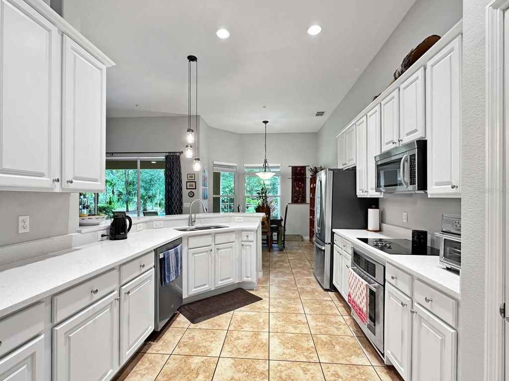 Photo of 36732 Nashua Boulevard, Sorrento, FL 32776 (MLS # TB8434891)