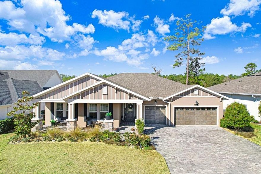 LIVE exceptionally in this 2022 custom-upgraded waterfront residence inside the gated golf enclave of Southern Hills Plantation Club. Perfectly positioned on a premium lot with sweeping water views and no rear neighbors, this home delivers privacy, serenity, and high-end design without the wait to build. NO CDD. This 3-bedroom + office, 3-bathroom, oversized 3-car garage home blends refined craftsmanship with modern comfort. A welcoming front porch sets the tone before you enter a grand foyer opening to an expansive great room with tray ceiling, shiplap fireplace, and triple sliders framing long water and tree-line views. The chef’s kitchen is designed to impress—quartz countertops, extended island seating, ceiling-height cabinetry with glass uppers, Café stainless appliances, gas cooktop, designer lighting, and seamless flow into the dining and living spaces. Luxury vinyl plank flooring, crown molding, plantation shutters, and elevated finishes carry throughout. The owner’s suite is a true retreat with water views, dual walk-in closets, and a spa-style bath featuring a freestanding soaking tub, dual quartz vanities, and a large walk-in shower. The triple-split layout provides privacy for guests, including a dedicated pool bath. Step outside to your private resort: brand-new custom pool, panoramic screened lanai, outdoor kitchen, dual covered patios, and extended paver entertaining space. This is Florida living done right—sunrise coffee, sunset swims, and complete backyard privacy. Additional highlights include a brick paver driveway, oversized garage with golf cart space, no flood insurance required, and cable/internet included in HOA.

Southern Hills offers a Pete Dye championship course, resort pool, tennis, pickleball, fitness center, dining, and social amenities—all just 35 minutes north of Tampa.

Luxury. Privacy. Move-in ready. Done.