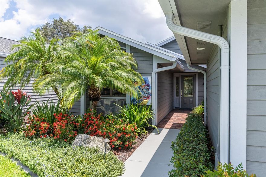 Welcoming luxury home featuring captivating views of the prestigious Sugar Mill Country Club community's golf course and nature preserves from the spacious living area and grand lanai. Enjoy entertaining with a built-in bar, dining area, and gorgeous chef's kitchen. This custom home features soaring ceilings and beautiful high end finishes throughout  the 3 bedrooms, 2.5 baths, and private office area with French glass doors. 2 Car Oversized plus Golf Cart Garage. The home's design also includes a large laundry room, an abundance of closet and storage space. Attention to every detail includes 3M Scotch Shield with a lifetime warranty on the back windows, invisible screens on exterior doors, remote-controlled master bedroom window coverings, and constantly cycling hot water throughout the house, ensuring instant availability. Meticulously maintained and recently upgraded with a Generac whole-home generator, home and driveway painting, new lawn landscaping with concrete curbing, and a new roof with solar electric panels. 
offered partially furnished: inquire for details. Amazing Community that includes Complete Lawn Care, Sprinklers, Premium Internet and Cable Package. ;Water: City