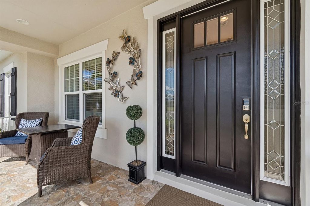 Photo of 7447 Lancaster Loop, Wesley Chapel, FL 33545 (MLS # TB8478541)