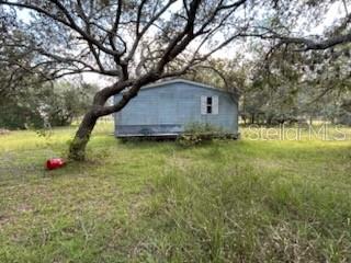 Photo of 13331 SE 30th St, Morriston, FL 32668 (MLS # O6444999)