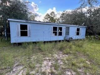Photo of 13331 SE 30th St, Morriston, FL 32668 (MLS # O6444999)