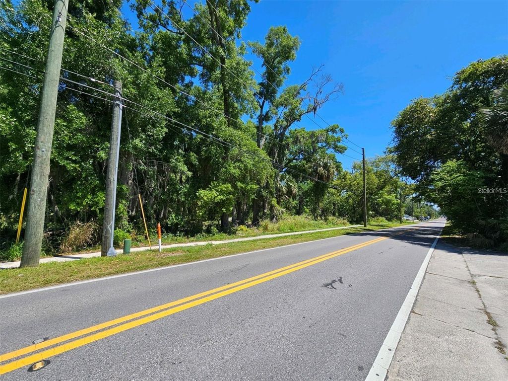 Photo of 2606 Country Club Road, Sanford, FL 32771 (MLS # TB8435488)