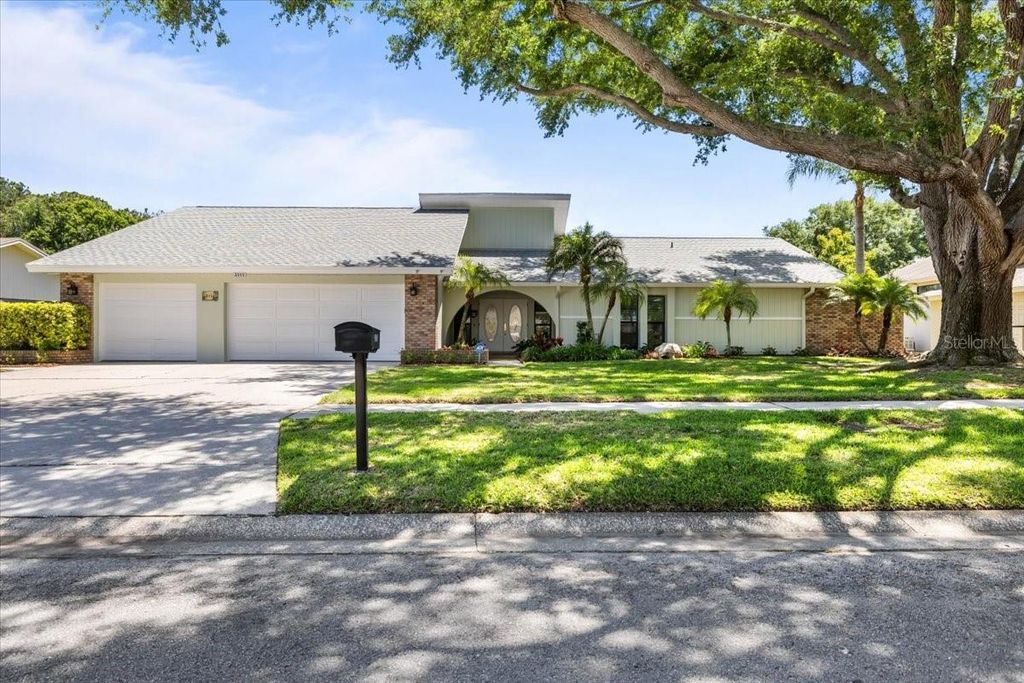 Photo of 3111 Hyde Park Drive, Clearwater, FL 33761 (MLS # TB8498107)