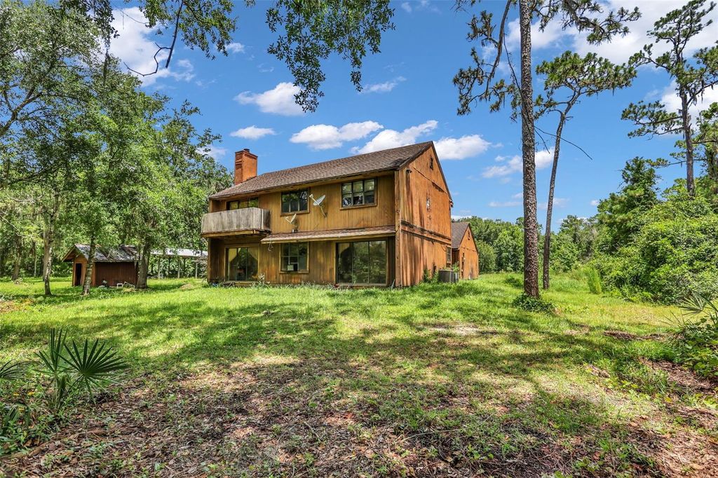 Photo of 24003 Sisler Avenue, Christmas, FL 32709 (MLS # O6424796)
