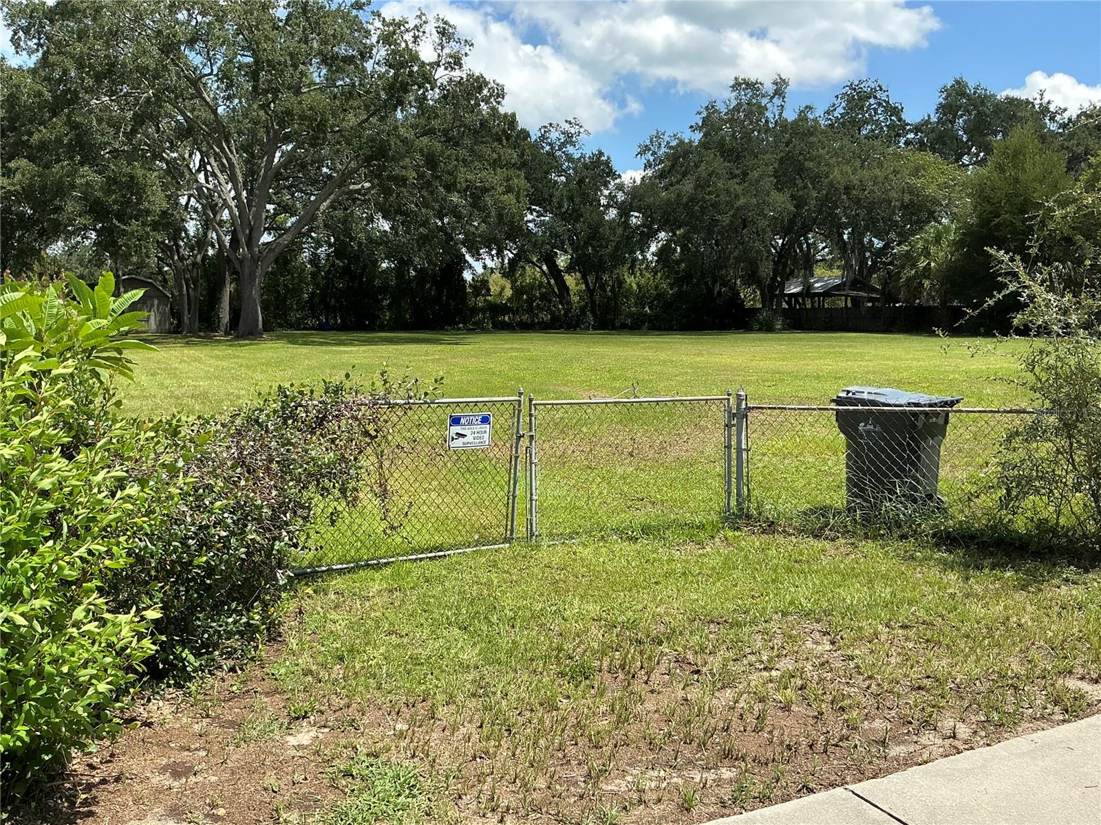 This vacant lot, just under ½ acre, is ready for your dream home. Zoned RSC-6, with water and sewer at the property. Easy access to 275 for quick commutes to top restaurants, shopping, and hospitals. USF is less than 13 minutes away. The adjacent lot is also for sale under MLS# TB8415599, offering a great opportunity to own nearly 1 acre in a growing area of Tampa.