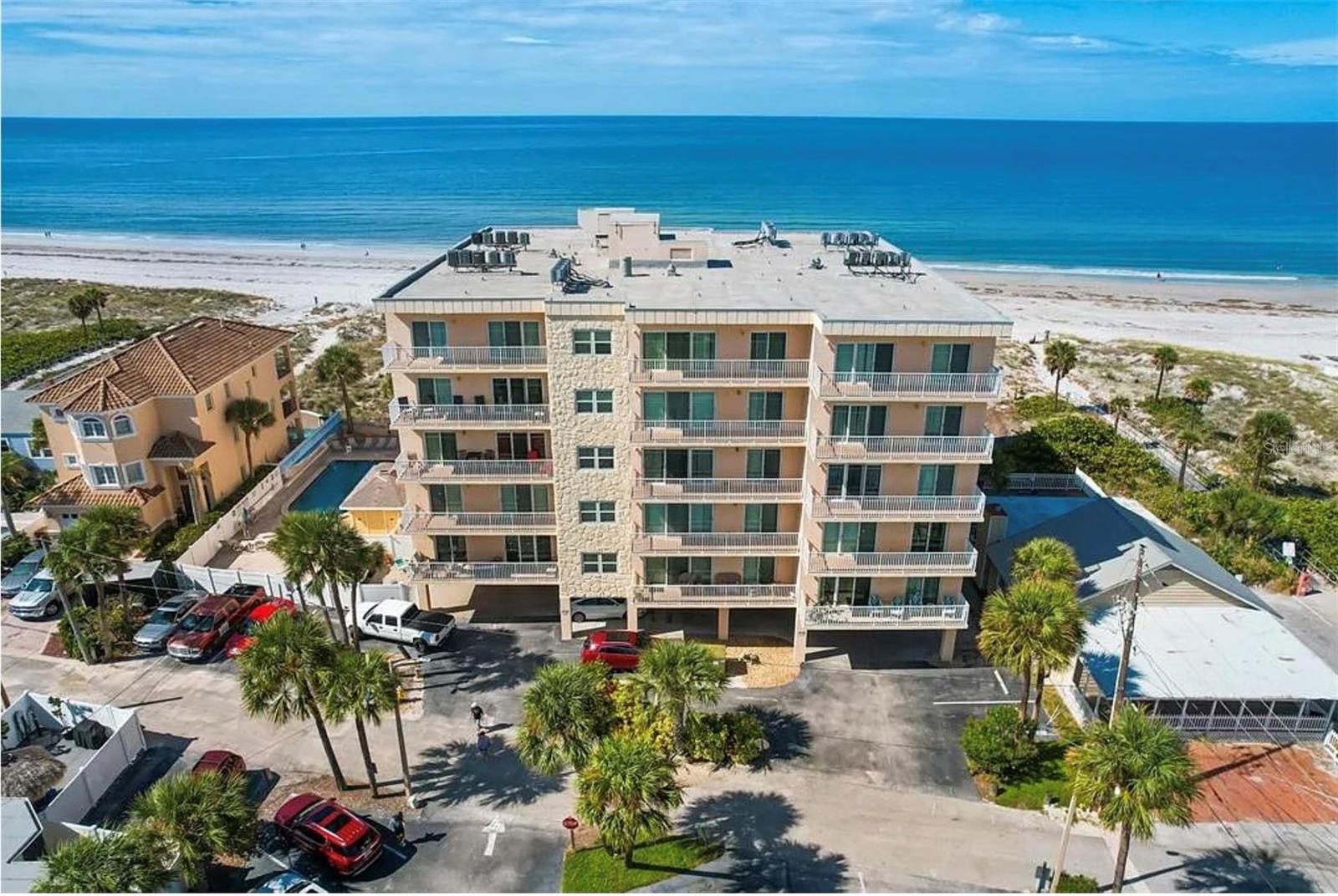 Collwood 501 is top-floor corner unit offering spectacular dual water views. From the living room and main spaces, enjoy panoramic east-facing views of the Intracoastal Waterway, marina, and colorful sunrises. The second bedroom showcases a stunning view of Madeira Beach’s sandy shoreline, stretching as far as the eye can see.
This condo comes fully furnished and features a spacious layout with great potential for personal use or as a weekly vacation rental. It’s move-in ready and offers plenty of natural light from its corner location. With a little vision, it could be transformed into a high-end coastal retreat.
Collwood offers an on-site rental and management office, making it ideal for those seeking strong rental income potential with hands-off convenience.
Community amenities include newly renovated beachfront pool with modern glass fencing for unobstructed Gulf views, plentiful lounge chairs, BBQ grilling area and shuffleboard. The updated lobby offering coded access for added security leads to indoor corridors that are secure and weather-protected for comfort during Florida's seasonal weather.