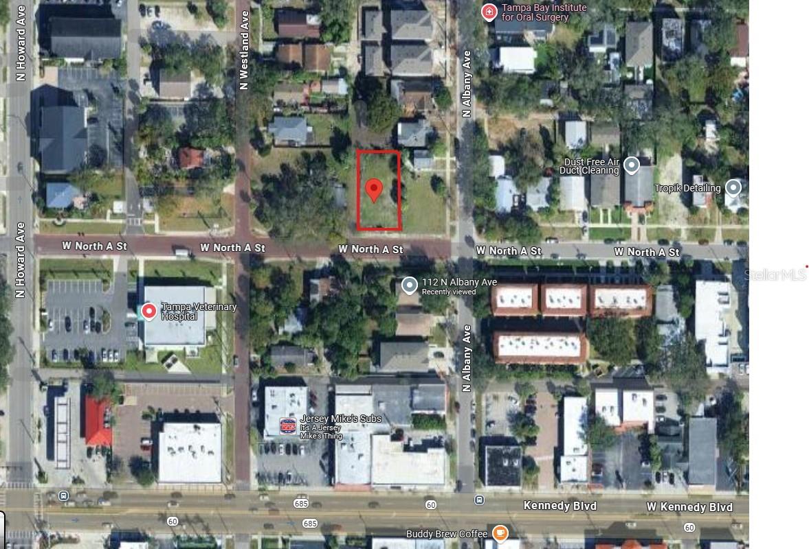 Prime opportunity in the heart of South Tampa’s vibrant West Land neighborhood! This vacant and cleared building lot boasts RM-16 multi-family zoning, allowing for a wide range of residential options—including duplexes, townhomes, or your custom dream home. The property’s coveted FEMA Code X designation means flood insurance is not required, adding value and peace of mind. Ideally located within the larger West Tampa area, you’ll enjoy quick access to both downtown Tampa and the Westshore business district. The lot features charming brick-paved frontage and convenient alley access to the west—ideal for private parking or easy rear entry. County records show expired plans for a 3-story duplex, offering a valuable head start for investors or builders looking to capitalize on this high-demand location. Additional benefits include potential for limited institutional or commercial uses as allowed by zoning. Seller financing is available—making this rare opportunity even more accessible! Embrace the best of South Tampa’s sports, entertainment, dining, and culture—all just minutes from your door. Bring your vision and build your investment portfolio or dream residence today!