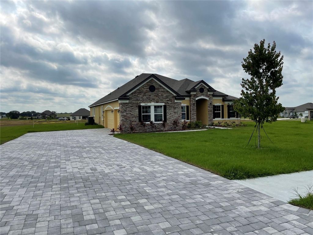 Photo of 10067 Dolphin Gull Circle, Thonotosassa, FL 33592 (MLS # TB8471209)