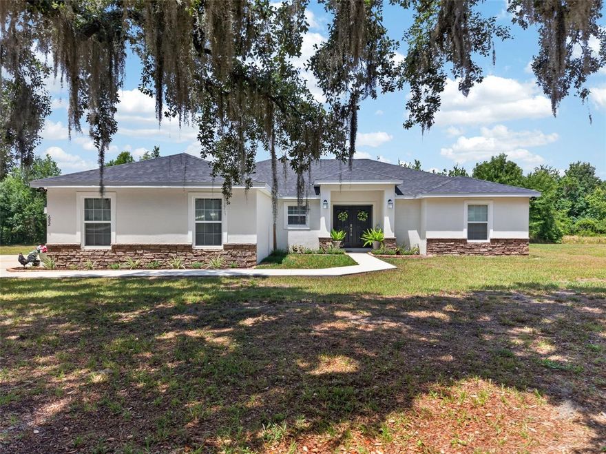 ***NEW DRONE FOOTAGE!! WELCOME to this gorgeous 2023-built home on 3.85 acres!! NO HOA! Offering the perfect blend of modern and peaceful country living, this beautiful 4 bedroom, 2 bath home with an expansive open floor plan that's ideal for both everyday living and entertaining. STEP inside to discover high ceilings, abundant natural light and a thoughtfully designed layout that flows from the spacious living areas to the incredible kitchen that boasts TONS of counter space and wood cabinets that all feature soft close doors/drawers. ONE of the highlights of this home is the MAGNIFICENT master suite you'll never want to leave with a HUGE stunning bathroom and walk-in shower. In this spilt plan there's plenty of space for an office to work from home and still have rooms for your family to grow.  OUTSIDE, the  fenced 3.85 acre property provides, plenty of room to roam, play or relax. There's even a zipline already in place. Enjoy the tranquility of acreage living while staying conveniently CLOSE to EVERYTHING you need. This home offers an easy commute to Tampa or Orlando via Polk Parkway making it IDEAL for those who want space without sacrificing location! Take advantage of this RARE opportunity and make this your home!
