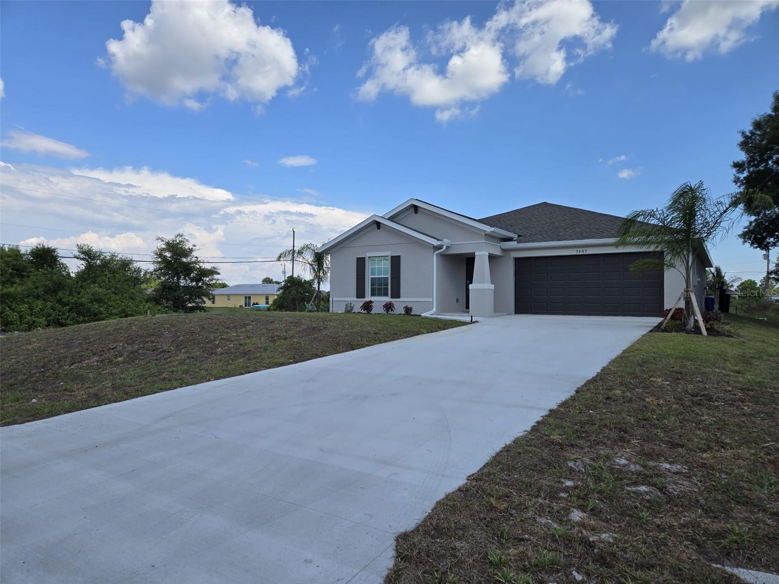 Experience modern living in this beautiful 2024 new construction home in Lehigh Acres. Featuring 3 bedrooms and 2 bathrooms, this open-concept design flows seamlessly from the living area to the gourmet kitchen with granite countertops and stainless steel appliances. Spacious bedrooms, elegant modern baths, private backyard, central A/C, and a full laundry room complete the home. Located in a vibrant, growing neighborhood, this property offers comfort, style, and convenience. Schedule your private tour today!
