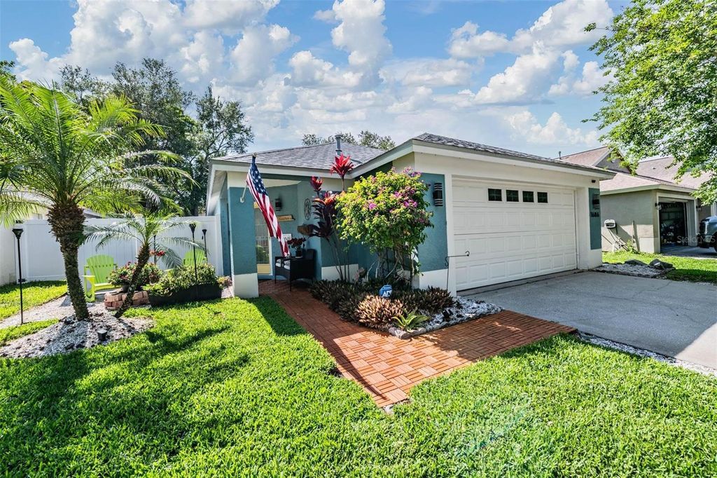 Photo of 1686 Oak Spring Drive, Tarpon Springs, FL 34689 (MLS # TB8499951)