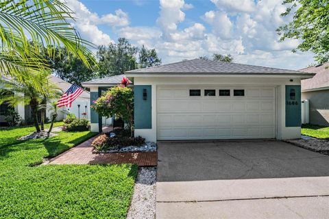 Photo of 1686 Oak Spring Drive, Tarpon Springs, FL 34689 (MLS # TB8499951)