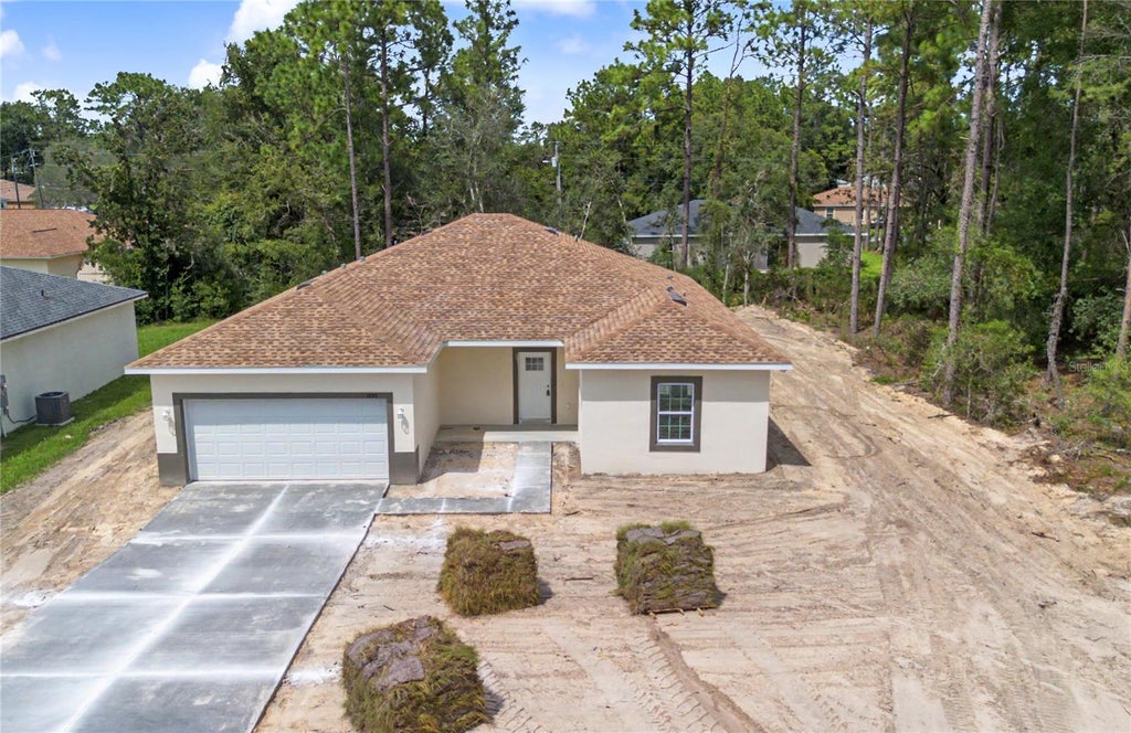 Photo of 7845 SW 127th Loop, Ocala, FL 34473 (MLS # O6441678)