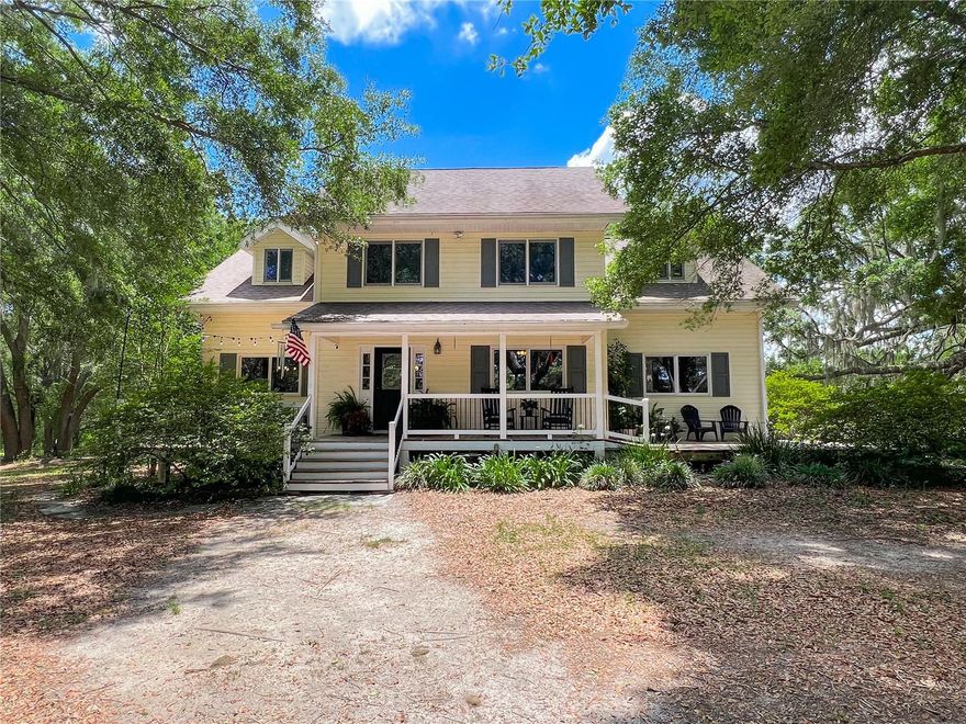 Experience timeless craftsmanship and serene country living in this 5,404 sq ft timber frame home, nestled beneath majestic granddaddy oaks and surrounded by lush pasture. A private paved drive leads to a gated entrance, offering privacy and charm from the moment you arrive.
Inside, soaring vaulted ceilings and rich wood beams create a dramatic first impression, complemented by real oak flooring and warm wood ceilings. The spacious main floor includes a formal living and dining room, fully equipped kitchen, breakfast area, cozy family room with high vaulted ceilings and fixed glass for lots of natural light, as well as a generously sized primary bedroom with walk in closet and an en-suite bath with separate soaking tub and shower and dual vanities. The upstairs bedrooms have vaulted ceilings, plenty of nooks and quiet areas to read, write, study or play music.  Upstairs also includes a full bath with tub and shower as well as an office.  Main floor extras include a laundry/utility with large pantry cabinets, mud room and exercise room. 

This home is perfect for multigenerational living or guests, the attached 2 story suite features a kitchen, living area, full bath with shower downstairs and includes its own entrance. Upstairs includes a large bedroom, plenty of storage closets, a full bath with shower and a massive media/bonus room offers endless possibilities—home theater, game room, or office space.

Outdoors, enjoy a detached workshop, trees to climb or swing on and even a charming chicken coop for your hobby farm dreams. With both open space and established trees, this one-of-a-kind property offers luxury, flexibility, and peace in equal measure.