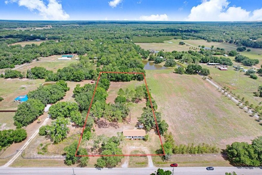 Welcome to your own private retreat in Plant City. Situated on almost 4 acres, this updated 3 bedroom 2 bath block home offers the perfect balance of modern upgrades, usable land, and peaceful country living—while still being conveniently located near Tampa and major highways. Inside, the home features new laminate flooring throughout, a renovated kitchen with all new appliances, refreshed bathrooms, newly painted interior, plus a large laundry room with a new washer and dryer. All this creates a bright, clean, move-in-ready space. The property is fully fenced, with 2 new entrance gates. No more water bills, the property features your own well and septic tank.? If you’ve been searching for a home with usable land and room to spread out, this is one you won’t want to miss. Schedule your showing today and come experience the space, privacy, and potential this property has to offer.