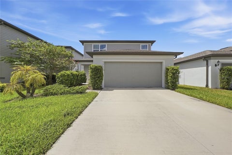 Photo of 9469 Rally Spring Loop, Wesley Chapel, FL 33545 (MLS # A4706814)