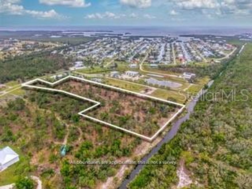 Rare Opportunity -Nature Lovers Dream!  6 Acres Prime Waterfront Land in Very Sought After Pirate Harbor! Discover the ultimate in Florida living with this exceptional 6 - Acre parcel  offering 400 feet of direct water frontage in highly desirable Pirate Harbor community. This rare find provides endless potential- whether you're dreaming of a luxury waterfront estate with panoramic views, and tropical landscaping or looking to develop up to 15 custom homes in one of the areas most sought -after boating and fishing destinations. Enjoy access to charlotte harbor and the gulf of Mexico , all while being minutes from dining , shopping and entertainment in Punta Gorda and Port Charlotte. Pirate Harbor is a hidden gem known for Beautiful and serene natural surroundings.  with zoning and utility access available , this property is ready for your vision - Build your dream or create an exclusive enclave of water front homes. Don't miss the chance to own or develop a piece of paradise. Opportunities like this are incredible rare in Pirate Harbor.