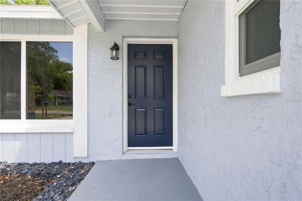 Photo of 7033 Wentworth Way, New Port Richey, FL 34655 (MLS # TB8543325)