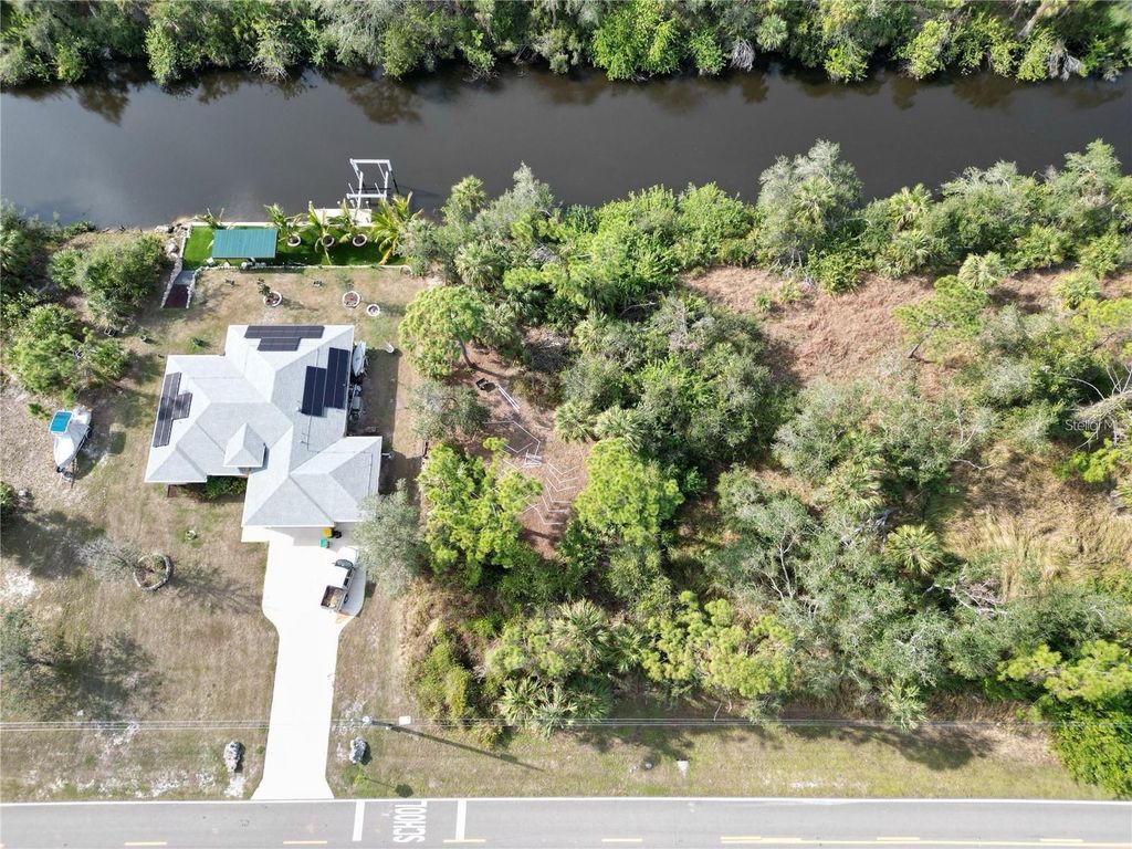 Photo of 1993 Cedarwood Street, Port Charlotte, FL 33948 (MLS # A4646736)