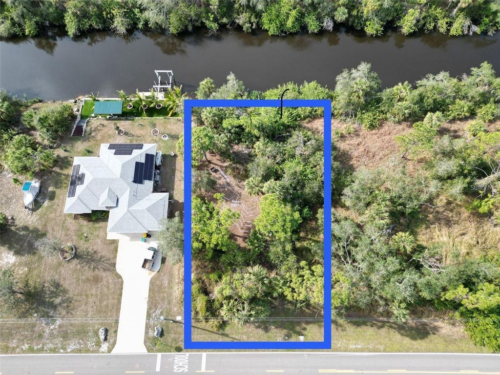 Photo of 1993 Cedarwood Street, Port Charlotte, FL 33948 (MLS # A4646736)