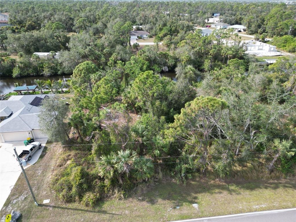 Photo of 1993 Cedarwood Street, Port Charlotte, FL 33948 (MLS # A4646736)