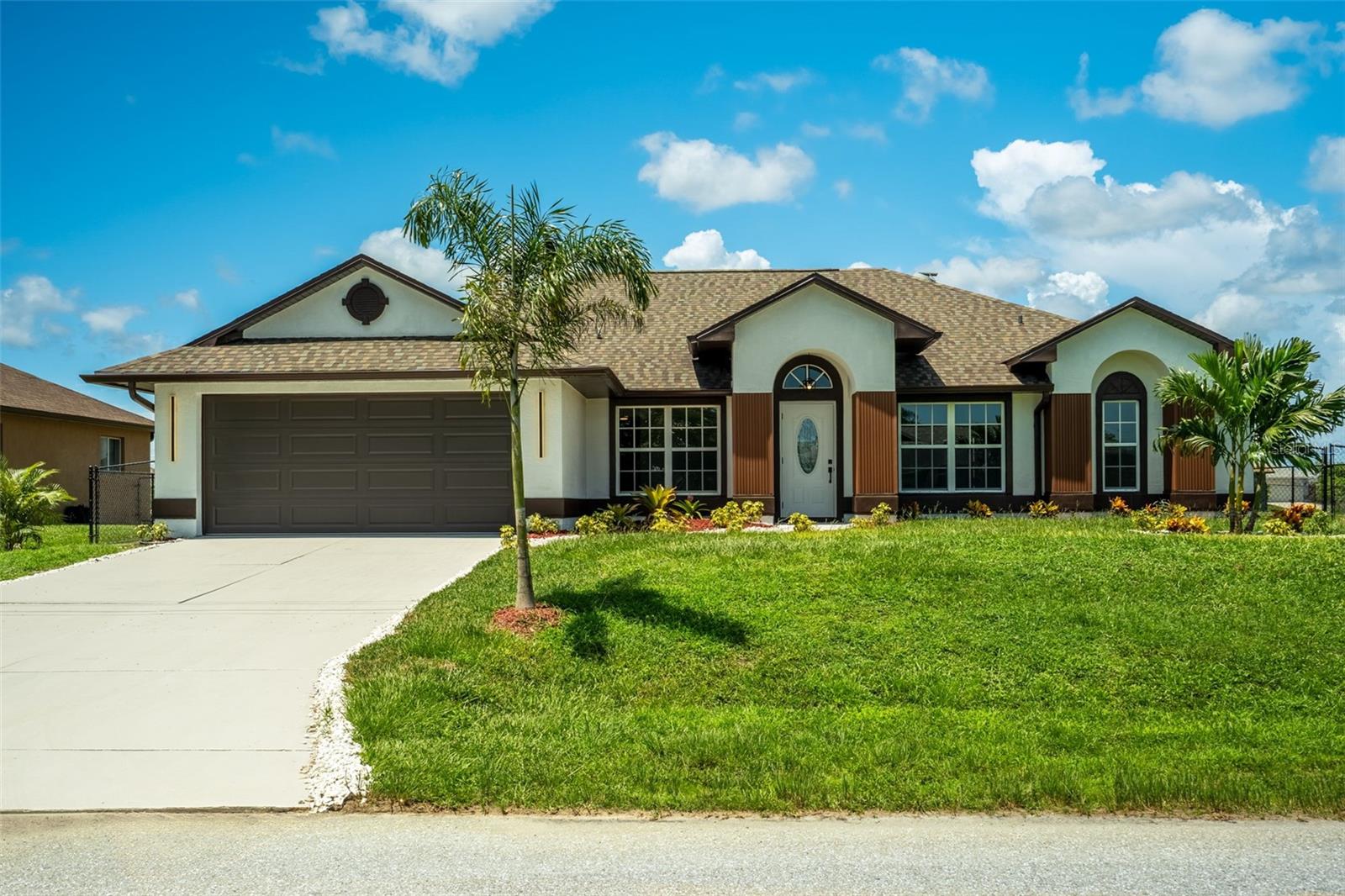 Totally remodeled canal-front pool home in one of the most sought-after neighborhoods in Southwest Cape Coral. This spacious 4-bedroom, 2-bath residence has been beautifully updated and is completely move-in ready. Recent improvements include a brand-new roof, new kitchen appliances, updated tile flooring throughout, a new A/C system, water heater, and garage door. The home also features a fully fenced yard, concrete seawall perfect for a future dock or boat lift, and hurricane shutters on all windows with mounting bolts already in place for quick and secure installation.
Inside, the open floor plan is filled with natural light and offers an inviting flow from room to room, ideal for both everyday living and entertaining. The backyard is a true retreat, with a sparkling pool and wide canal views that create the perfect Florida lifestyle setting. Pool equipment has also been recently updated for worry-free enjoyment.
All city assessments are paid in full, giving buyers peace of mind. This home is ideally located just minutes from Del Prado Boulevard and Veterans Parkway, placing shopping, dining, schools, and everyday conveniences right at your fingertips. Whether you are searching for a full-time residence, a vacation home, or an investment property, this home is a must-see. Easy to show. Must see!!!