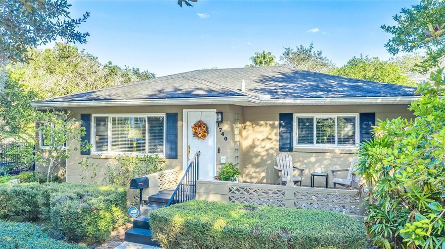 Classic Winter Park home in the Audubon Park school district. One story two bedroom home with hardwood floors and a fantastic screened in lanai to relax and enjoy the sights and sounds of the outdoors and entertain. Many updates have been done throughout the years. Lovely kitchen with induction oven/stove,Bosch microwave,granite counters and a breakfast seating area, large living/family room with Dolby Atmos ceiling speakers, main bath remodeled,two sets of french doors lead out to the back patio/lanai, detached two car garage, circular driveway with security gate to garage and tropical back yard. HVAC unit installed in 2018, Roof replaced  in 2013 and the utilities are underground. Outdoor shower behind garage has both hot and cold settings.