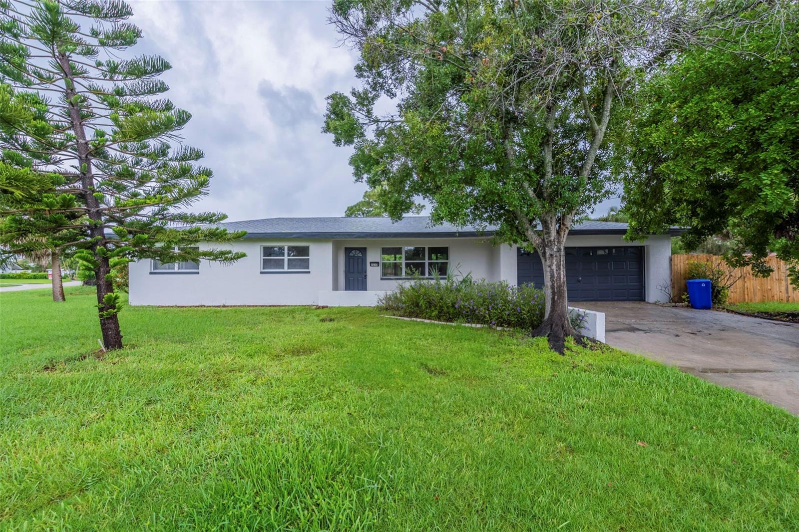 This beautifully renovated 4-bedroom, 2-bath home features fresh paint, new flooring, and an open kitchen with updated cabinets and stainless steel appliances, offering a modern and inviting space ready to enjoy.