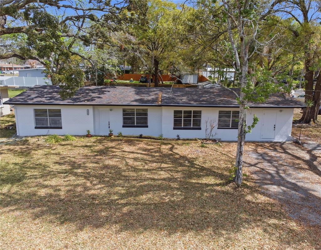 Photo of 10945 N Blvd, Tampa, FL 33612 (MLS # TB8495775)