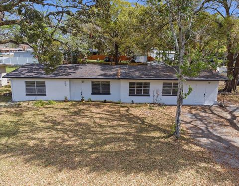 Photo of 10945 N Blvd, Tampa, FL 33612 (MLS # TB8495775)