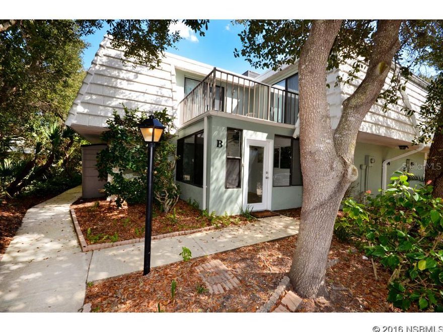 Under contract taking backups. This immaculate remodeled Bahamian Club unit is being offered furnished and ready to make your home, vacation home or investment property. Nestled within a beautiful town home community shaded by a natural oak hammock, you will be located within a short walk to the non-driving beach, restaurants and have access to great amenities featuring an in-ground heated pool, tennis courts and clubhouse/activities center with onsite management. As you enter your new home through the enclosed sun-filled Florida Room youâll find a new custom kitchen with granite counters, stainless appliances, wood cabinets, recessed LED lighting and a deep basin stainless under-mount sink with a kitchen window. Tile flooring throughout the downstairs with high quality engineered wood-laminate flooring upstairs. All bathrooms are remodeled with granite counters, wood vanities and under-mount sinks. Downstairs half-bath has in-unit washer and dryer. A/C system is NEW inside and out. Both bedrooms are larger than average with separate bathrooms and master has walk-in closet. Easy access to your reserved parking space and a great location within the complex! ;LocationDescription: Condo ;Water: City