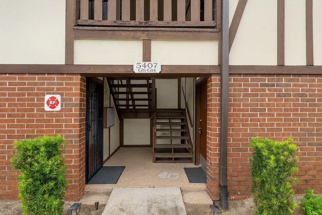 Photo of 5407 Hansel Avenue #G13, Orlando, FL 32809 (MLS # O6439630)