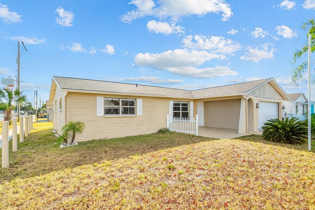 Photo of 6450 Tralee Avenue, New Port Richey, FL 34653 (MLS # TB8448221)