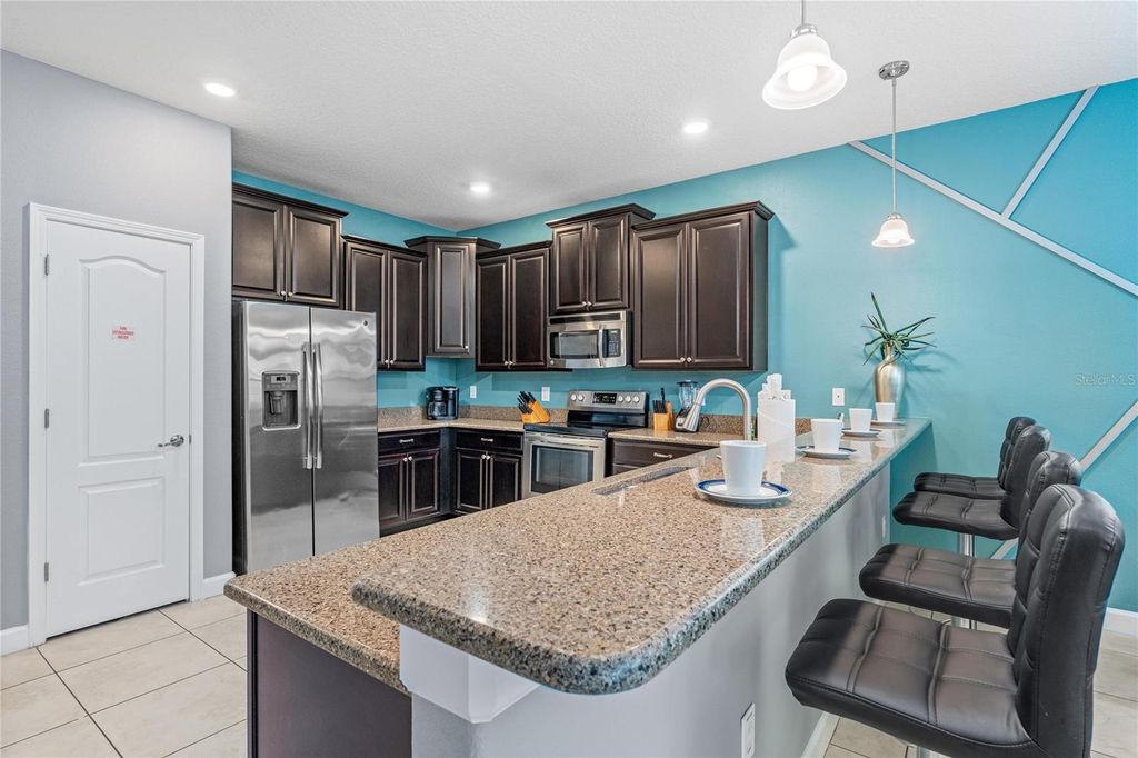 Photo of 9158 Wedge Drive, Davenport, FL 33896 (MLS # O6394575)