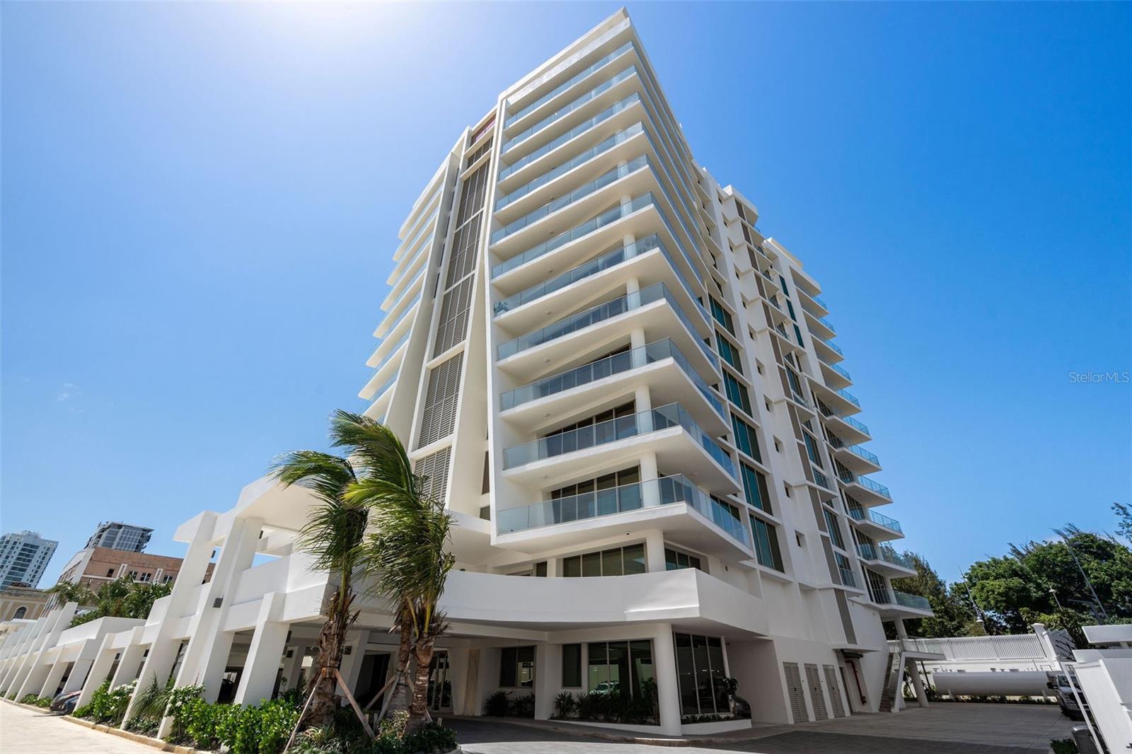 Welcome to Le Parc, San Juan’s newest luxury residential condominium, completed in 2025. Redefining modern elegance, this thoughtfully designed development offers a curated lifestyle with one-of-a-kind amenities unique to Puerto Rico.
Located on the 8th floor, this 2-bedroom, 2.5-bath residence spans 2,015 sq. ft. of meticulously designed living space. Floor-to-ceiling windows fill the interior space with natural light, creating an inviting and airy ambiance throughout.
The open-concept living and dining areas flow seamlessly into a custom Italian kitchen, equipped with top-of-the-line cabinetry and premium appliances.
From the living area, step out onto your spacious private balcony to enjoy sweeping views of San Juan Bay and a side view of the ocean—an ideal setting for morning coffee or evening relaxation.
Additional features include: electric curtains, recessed lighting, integrated, Sonos sound system, and custom built-in closets.
The apartment has 2 parking spaces and a storage closet.
Premium amenities offered at Le Parc include:
- Resort-Style Pool Deck: Enjoy two pools — a lap pool and a shallow pool perfect for lounging or little ones. Plus, an outdoor BBQ area and stylish seating & lounge areas.
- Private Rooftop Experience: Unwind in the rooftop lounge & terrace area featuring an activity room and personal wine cellar storage — exclusively for Le Parc’s 35 residences.
- State-of-the-Art Fitness Center
- Wellness Spa: Cold plunge, massage room, plus men’s and women’s sauna and steam rooms.
- Pickleball Court & Dog-Friendly Area
- 24/7 Security for Peace of Mind