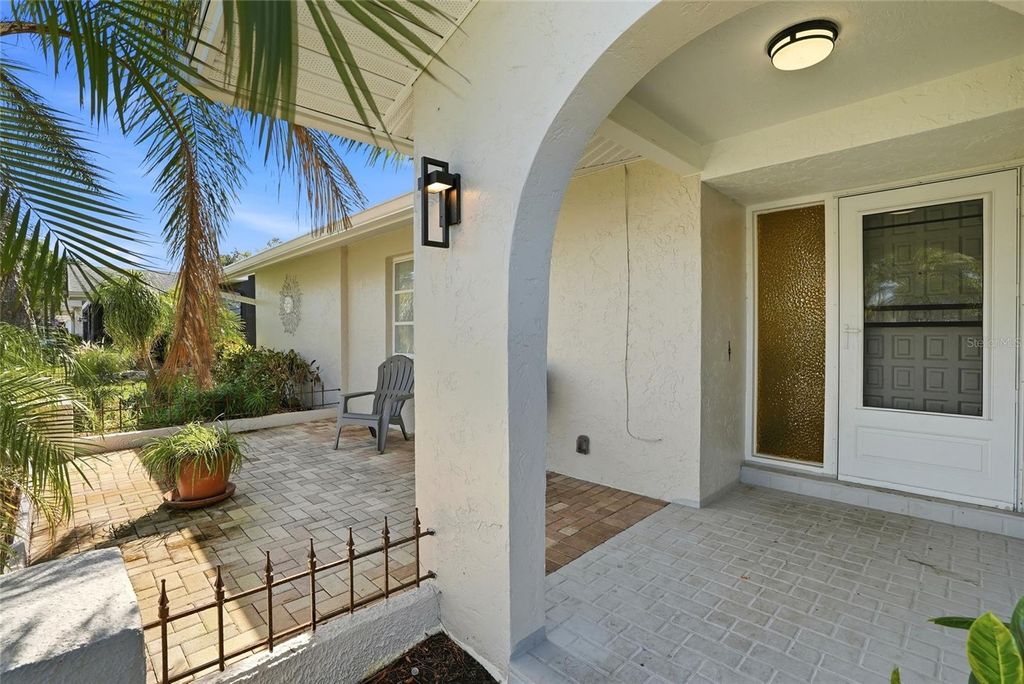 Photo of 3370 Harbor Lake Dr, Largo, FL 33770 (MLS # TB8484465)