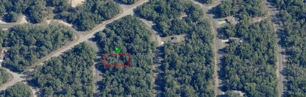 Photo of 6455 N Whispering Dr, Citrus Springs, FL 34434 (MLS # OM705333)