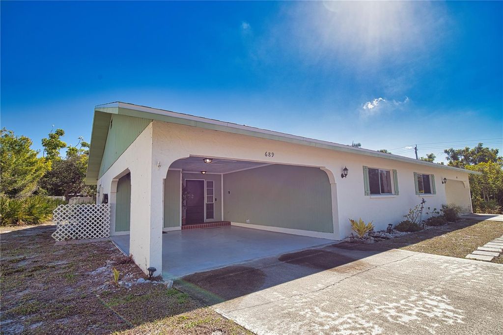 Photo of 689 Michigan Avenue, Englewood, FL 34223 (MLS # D6147274)
