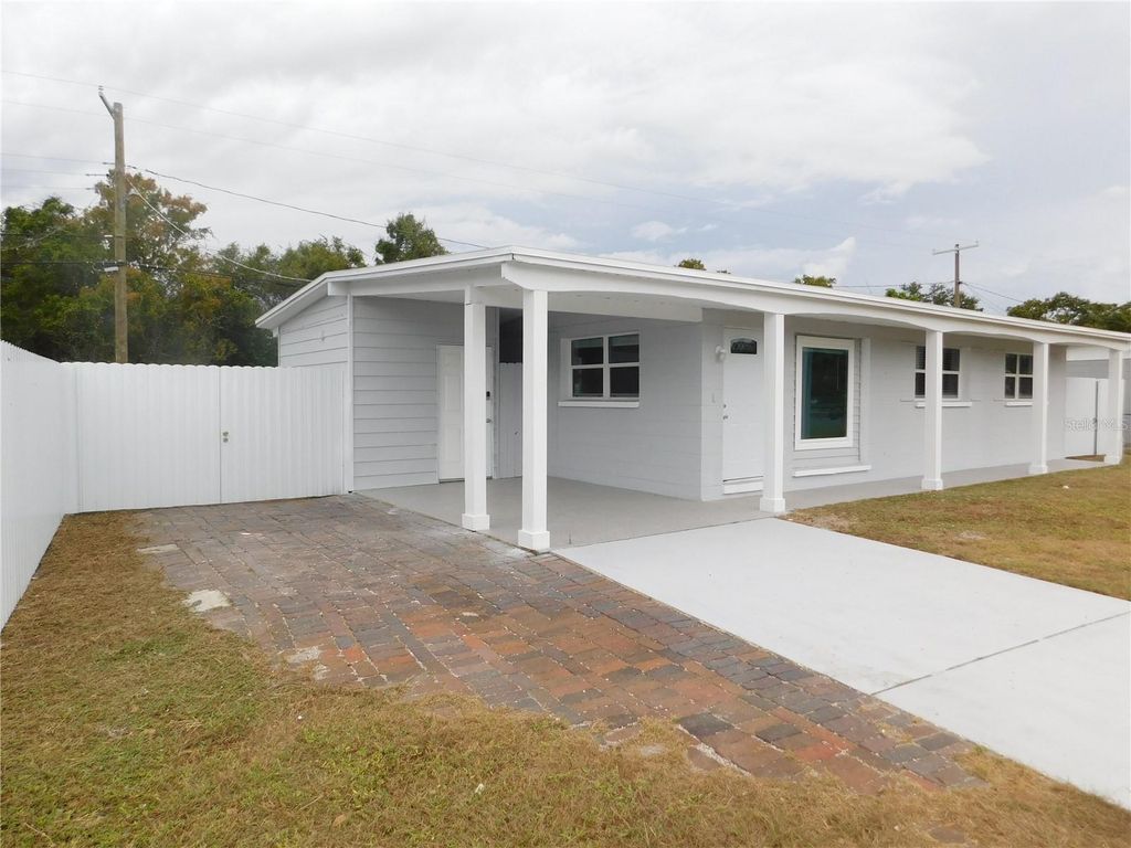 Photo of 2015 Wishing Well Way, Tampa, FL 33619 (MLS # O6359168)