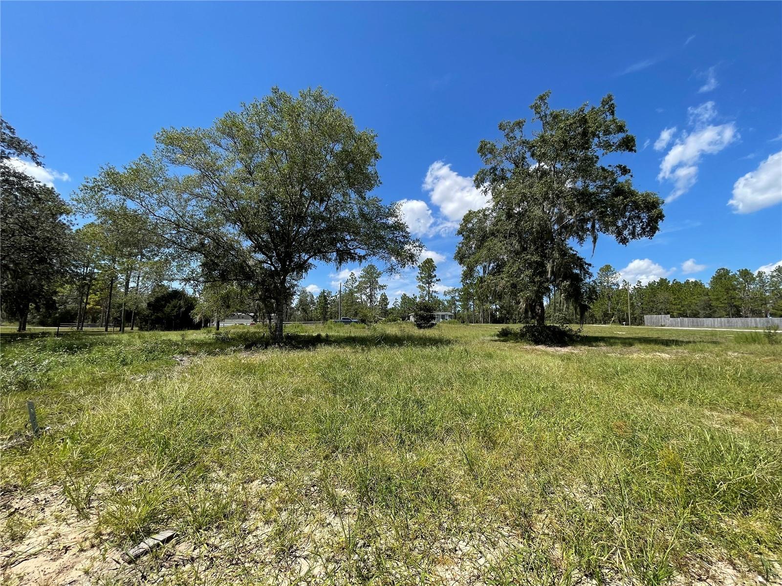 Nice 1.34 acres with Well, power pole and septic ready for your site built home or manufactured home.