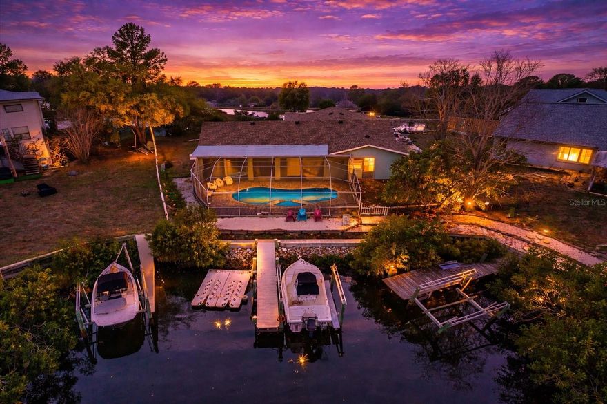 Waterfront opportunity in Apollo Beach! This 4-bedroom, 2-bath split floor plan home with a 2-car garage sits at the end of a canal offering privacy and great boating access. The property features a newer 10,000-lb boat lift, private dock, and even includes a boat, boat trailer, two Sea-Doos with trailer, and docking station—ready for your Florida waterfront lifestyle.

This Home did take on 10 inches with Helene and has been remediated and updated with ceramic tile throughout, new doors, and trim and drywall/sheet rock, AND A BRAND NEW ROOF. 

Enjoy your private outdoor oasis with a figure-eight style pool and a new pool liner and all of the equipment you need with it and center hot tub that overflows into the pool, all under a screened lanai with a new pool liner. Two bedrooms open directly to the lanai, creating seamless indoor-outdoor living. The primary suite includes a large walk-in closet.

Inside you'll find new flooring, trim, and doors throughout. The property also includes a 150-gallon propane tank already plumbed for grilling and a fenced side yard perfect for large dog breeds.

Existing kitchen refrigerator does not convey, the one in the garage will replace it. TVs do not convey wall mounts do not convey.

No HOA. No restrictions. Waterfront living and everything you need to entertain and live your best waterfront life.
Schedule your showing today and let's get you living on the water.

one or more photos may have been virtually staged.