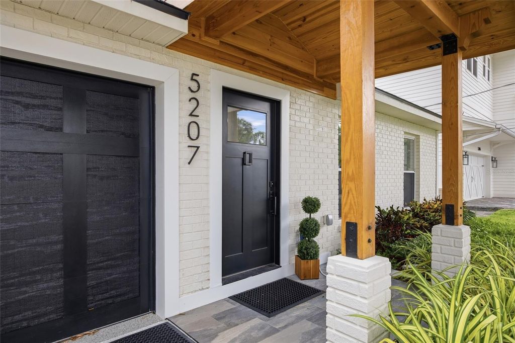 Photo of 5207 W Cleveland Street, Tampa, FL 33609 (MLS # TB8516242)