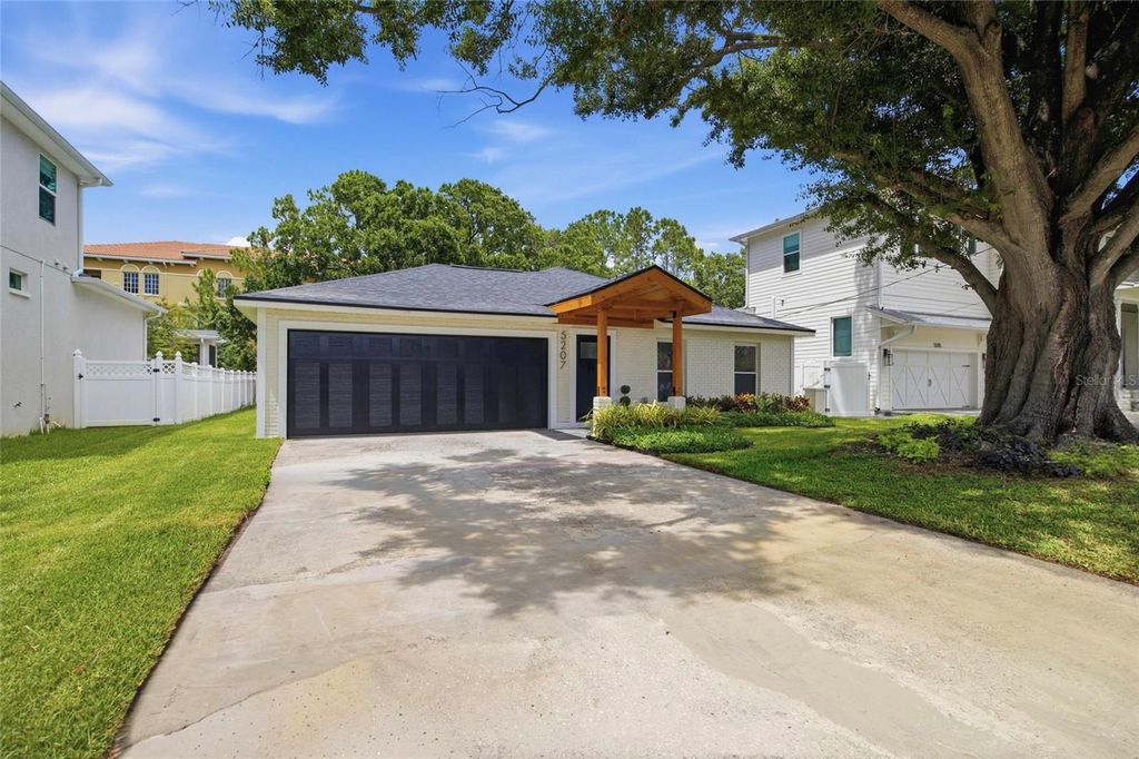 Photo of 5207 W Cleveland Street, Tampa, FL 33609 (MLS # TB8516242)