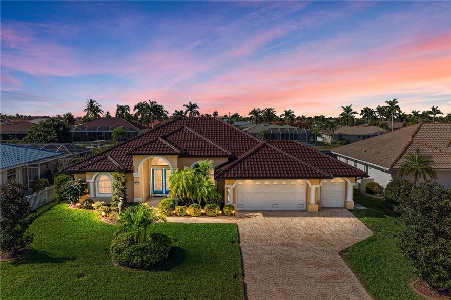 Stunning Remodeled Waterfront Pool Home in Punta Gorda Isles – Sailboat Access!
Don’t miss this exceptional 3-bedroom, 2-bathroom, 3-car garage waterfront pool home located in the heart of Punta Gorda Isles, one of Southwest Florida’s most sought-after boating communities. Perfectly positioned on a wide canal with fast access to Charlotte Harbor and the Gulf, this meticulously maintained residence offers the ideal blend of luxury, functionality, and Florida lifestyle.

This home features a new stone-coated steel metal roof, full hurricane protection, NEW HVAC, luxury vinyl plank flooring, and quartzite countertops, offering peace of mind and modern coastal style. From the moment you arrive, the manicured landscaping and architectural details showcase pride of ownership.

Inside, enjoy an open split floor plan with vaulted ceilings and abundant natural light. The expansive great room features a wall of sliding glass doors that open seamlessly to the covered lanai and heated waterfront pool, creating effortless indoor-outdoor living. The private primary suite offers dual walk-in closets with custom organizers, direct lanai access, and a spacious en-suite bath with dual vanities, soaking tub, and walk-in shower.

The kitchen is designed for both entertaining and everyday living, featuring generous cabinetry, ample prep space, breakfast bar, coffee station, and dinette with aquarium windows overlooking the pool and canal. A formal dining room with tranquil garden views adds flexibility for hosting guests. Two spacious guest bedrooms provide excellent closet space and natural light, with one currently used as an office featuring sliders to the pool and canal views. A pool bath offers convenient lanai access.

At the water’s edge, boaters will appreciate 82 feet of city-maintained concrete seawall, over 60 feet of concrete dock, and a boat lift with water, electric, and fish-cleaning station—ideal for serious boating enthusiasts. Additional highlights include a large laundry room with storage, a 3-car garage with decked attic space, 10.5’ elevation, and transferable flood insurance. Furniture available separately.

Located minutes from downtown Punta Gorda, Fishermen’s Village, golf, pickleball, shopping, dining, weekly farmers markets, and golf-cart friendly streets—this home truly has it all. Priced to sell—schedule your private showing today and start living the Punta Gorda Isles waterfront lifestyle.