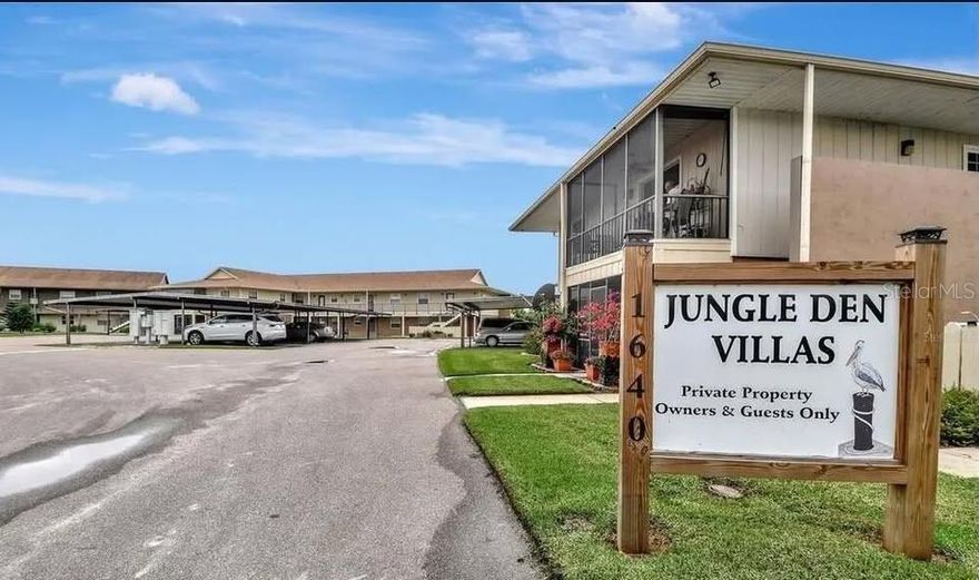 Welcome to Jungle Den Condominiums—a beautifully maintained riverfront community nestled directly on the St. Johns River in Astor, Florida. This spacious, fully furnished second-floor end unit offers breathtaking views of the river, pool, and surrounding canals, making it ideal for full-time living, a winter retreat, or a smart investment property. Inside, the open floor plan features two bedrooms and one remodeled bath along with new appliances, lighting, fans, faucets, door hardware, and tall baseboards. The kitchen and dining area showcase a stylish metal ceiling, and the unit has been recently painted. Enjoy the cozy ambiance of a new electric fireplace and the elegance of plantation shutters throughout. A full-size washer and dryer, multiple walk-in closets, a large kitchen pantry, and a storage closet on the wraparound balcony porch add to the convenience and comfort.
The complex offers a wealth of amenities, including an assigned covered boat slip with lift, a fishing pier, shared fish cleaning station, a sparkling community pool, and a welcoming clubhouse. Manicured grounds and assigned covered vehicle parking right by the unit ensure ease of access, while on-site boat trailer parking adds extra value.  Located just minutes from local restaurants, grocery stores, and shopping—and only a 30–40-minute drive to the beaches and city amenities of Daytona Beach, Ormond Beach, DeLand, and Ocala—this condo places you at the crossroads of relaxation and adventure. With nearby natural springs and hiking trails, there are endless opportunities to explore. Come join the fun and make this riverfront gem your next home base.  
SELLER/OWNER is a referral R.E. Agent with Gaff’s Realty, Daytona BCH, Fl