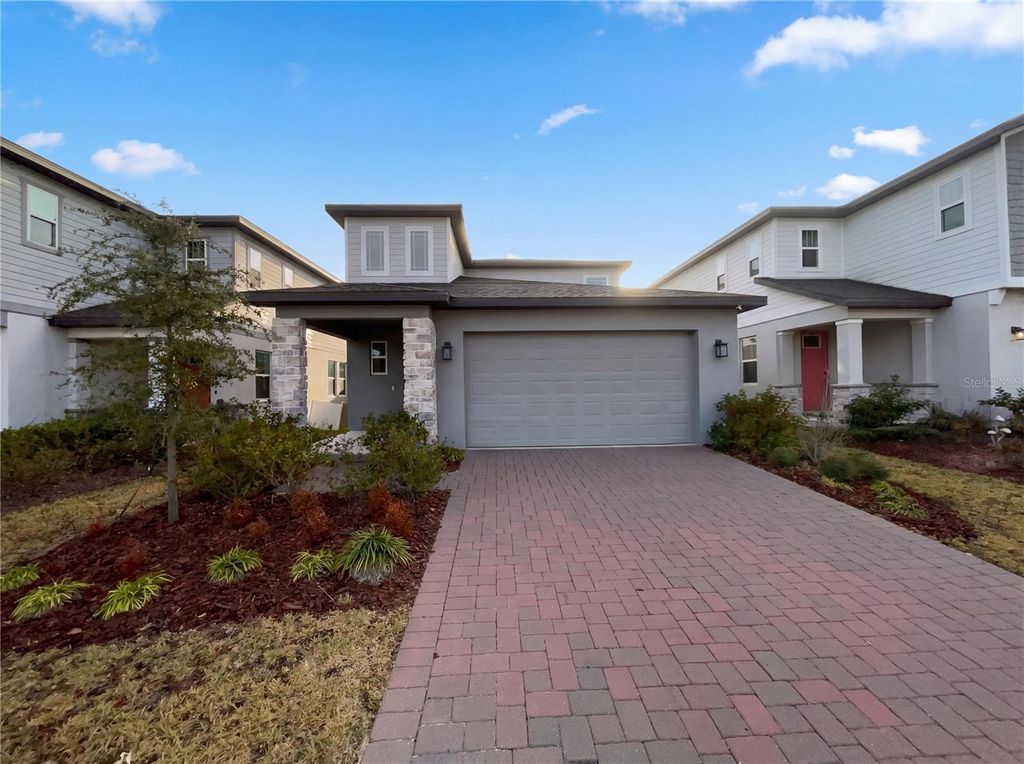 Photo of 2348 Mystic Maze Lane, Clermont, FL 34715 (MLS # O6384375)